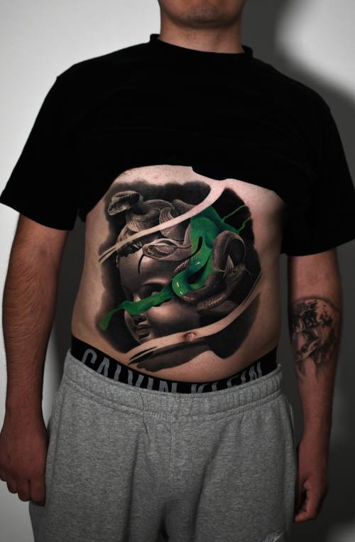 Marble bust with a green snake, stomach tattoo