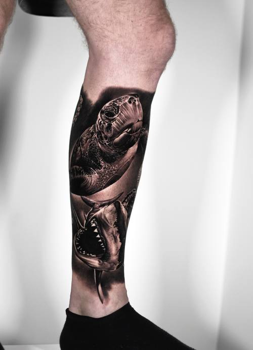 Sea turtle and shark, black and grey calf tattoo