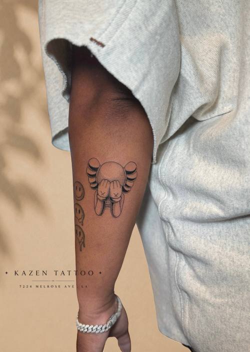 Small cat face outline, fine line forearm tattoo by Amina at KAZENTATTOO, Los Angeles