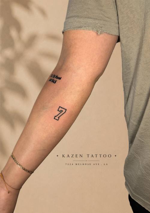 Tiny symbol on the forearm, fine line tattoo by Amina at KAZENTATTOO, Los Angeles