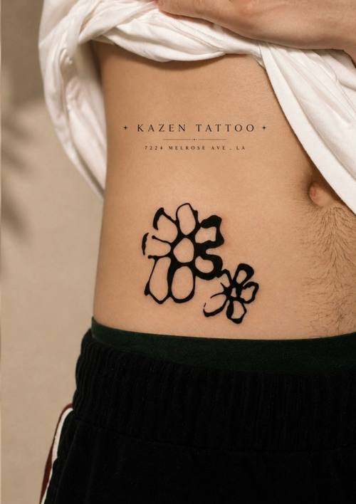 Flowers on the hip, fine line tattoo by Amina at KAZENTATTOO, Los Angeles