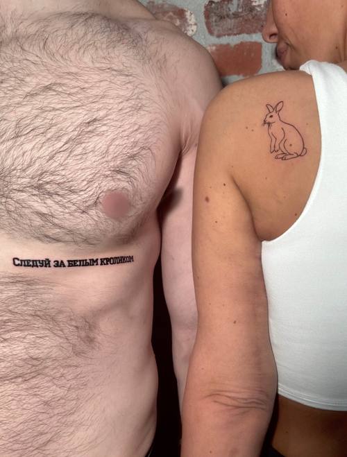Script along the ribs, fine line tattoo by Amina at KAZENTATTOO, Los Angeles