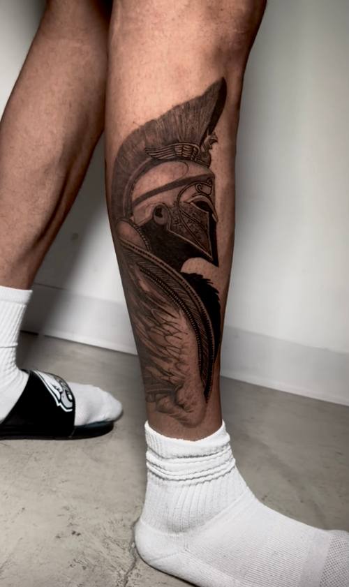 Dense dark piece on the forearm, black and grey tattoo by Amina at KAZENTATTOO, Los Angeles