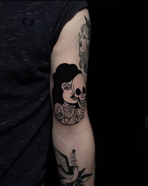 Botanical work with a portrait on the arm, black and grey tattoo by Amina at KAZENTATTOO, Los Angeles