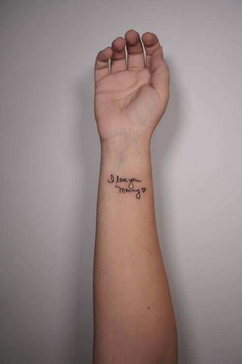 Small script on the inner forearm, fine line tattoo by Amina at KAZENTATTOO, Los Angeles