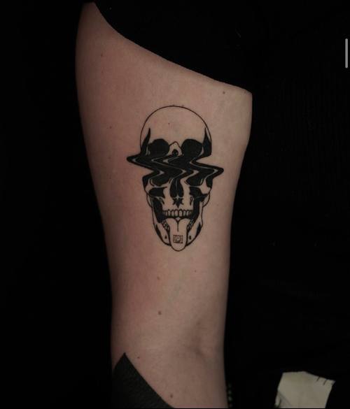 Winged skull on the thigh, black and grey tattoo by Amina at KAZENTATTOO, Los Angeles