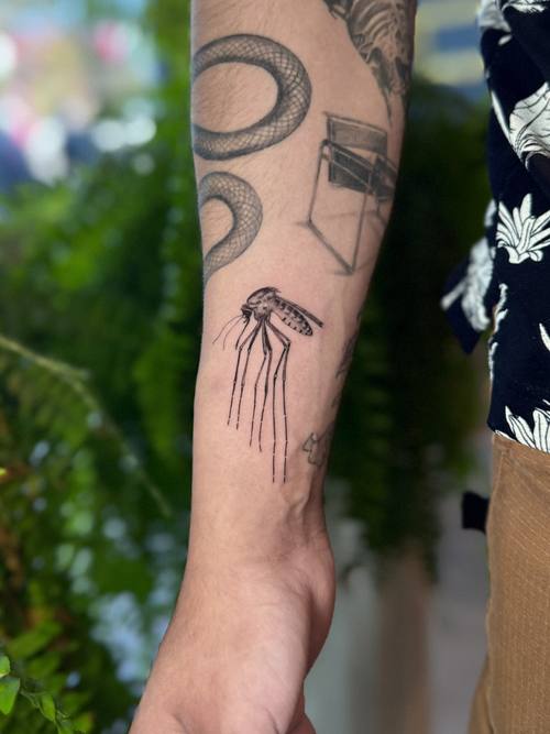 Jellyfish on the forearm, fine line tattoo by Amina at KAZENTATTOO, Los Angeles