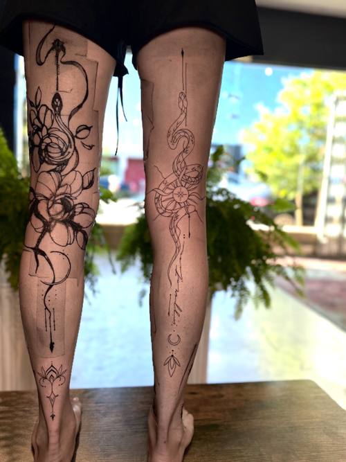 Botanical work down the leg, fine line tattoo by Amina at KAZENTATTOO, Los Angeles