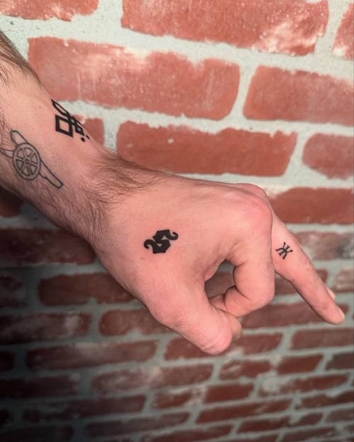 Small dice on the hand, fine line tattoo by Amina at KAZENTATTOO, Los Angeles