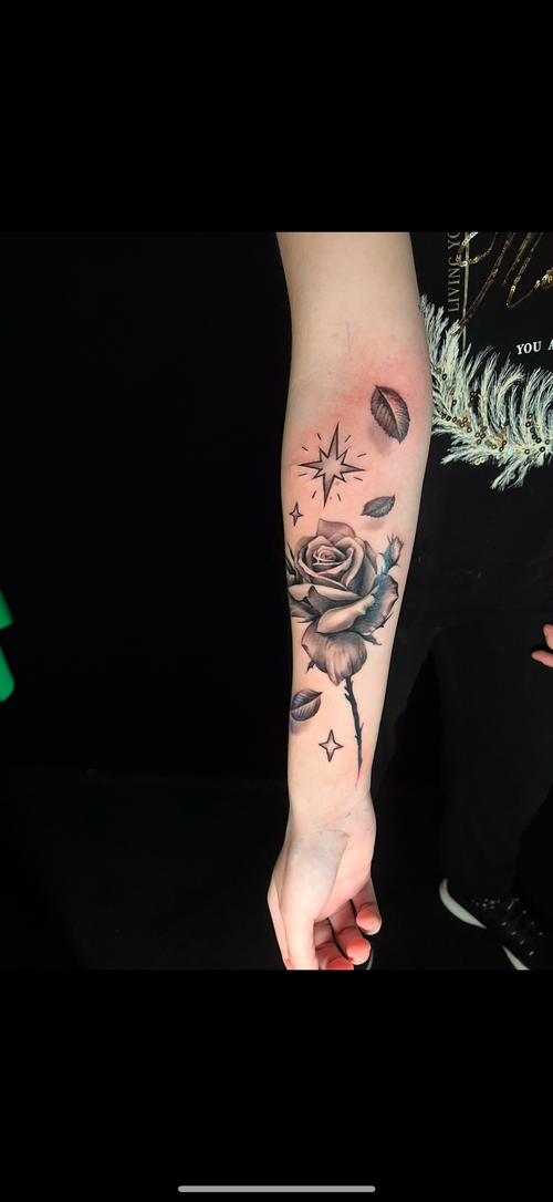 Colour work along the leg by Amina at KAZENTATTOO, Los Angeles