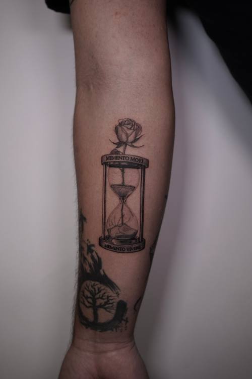 Hourglass with a rose on the calf by Amina at KAZENTATTOO, Los Angeles, second view