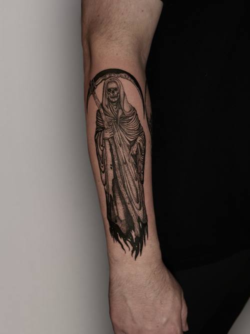 Robed figure on the forearm, black and grey tattoo by Amina at KAZENTATTOO, Los Angeles
