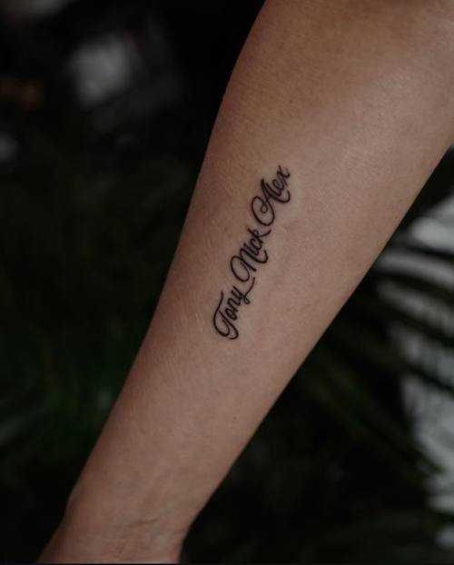 Script on the forearm, fine line tattoo by Amina at KAZENTATTOO, Los Angeles