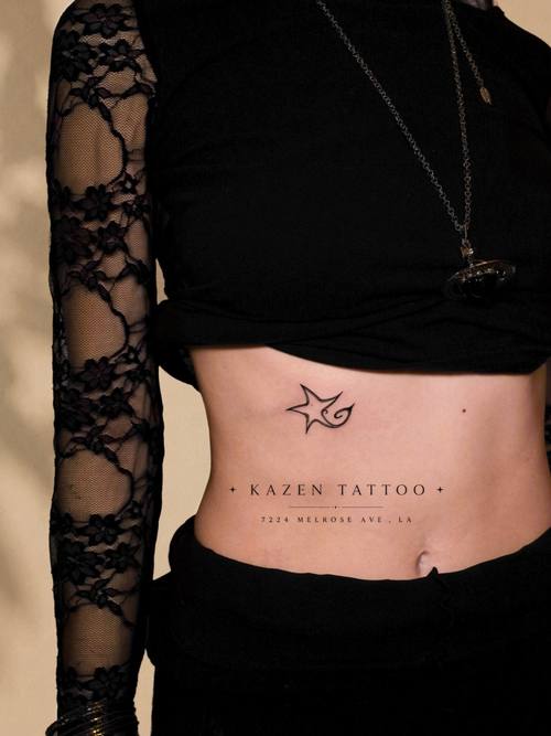 Small star on the stomach, fine line tattoo by Amina at KAZENTATTOO, Los Angeles