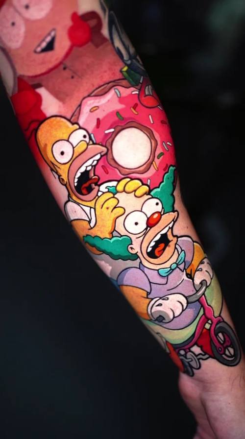 Colour cartoon characters sleeve by Livio at KAZENTATTOO, Los Angeles