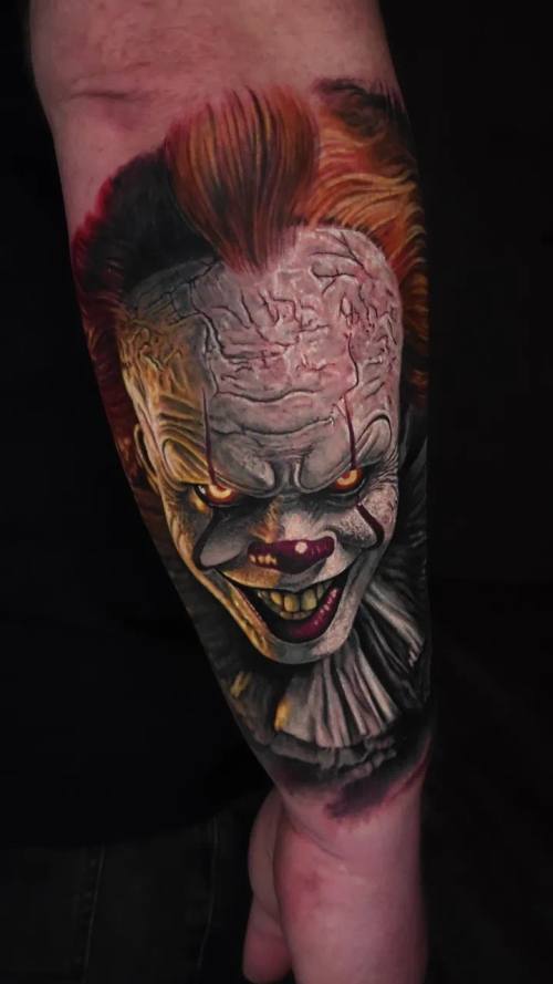 Horror clown portrait, colour realism calf tattoo by Livio at KAZENTATTOO, Los Angeles