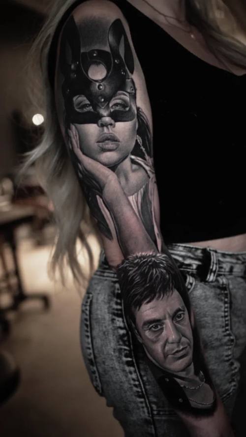 Masked woman and a man's portrait below, colour realism arm sleeve by Livio at KAZENTATTOO, Los Angeles