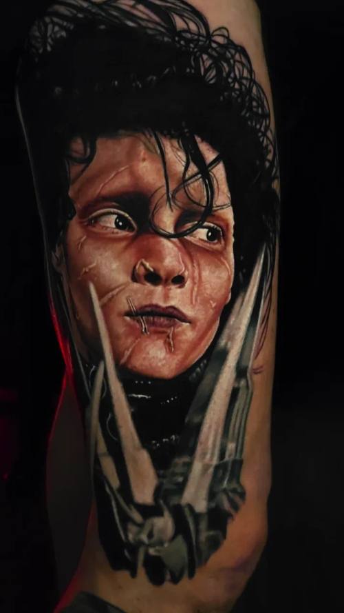 Pale man with blade hands, colour realism arm tattoo by Livio at KAZENTATTOO, Los Angeles