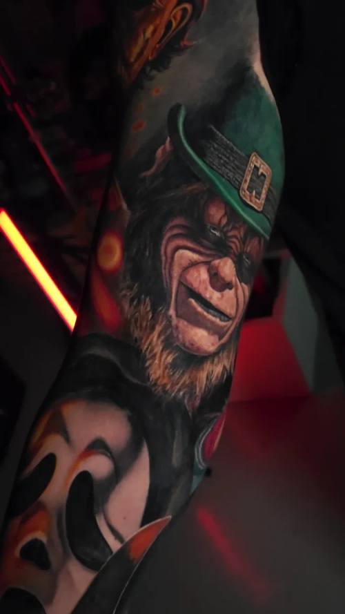 Leprechaun figure with a ghost mask, colour arm sleeve by Livio at KAZENTATTOO, Los Angeles