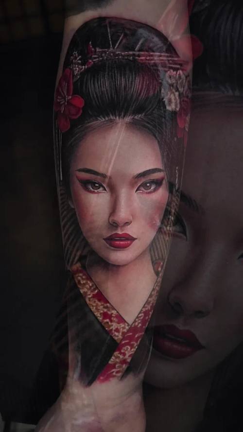 Geisha portrait with flowers, colour realism arm tattoo by Livio at KAZENTATTOO, Los Angeles