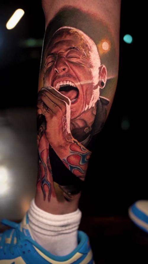 Horror creature with a long tongue, colour realism calf tattoo by Livio at KAZENTATTOO, Los Angeles