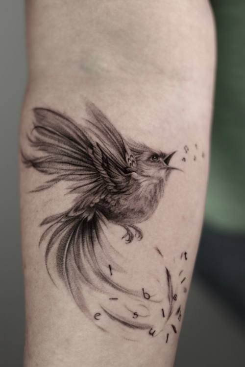 Bird in flight with scattering feathers, fine line forearm tattoo by Marrie at KAZENTATTOO, Los Angeles