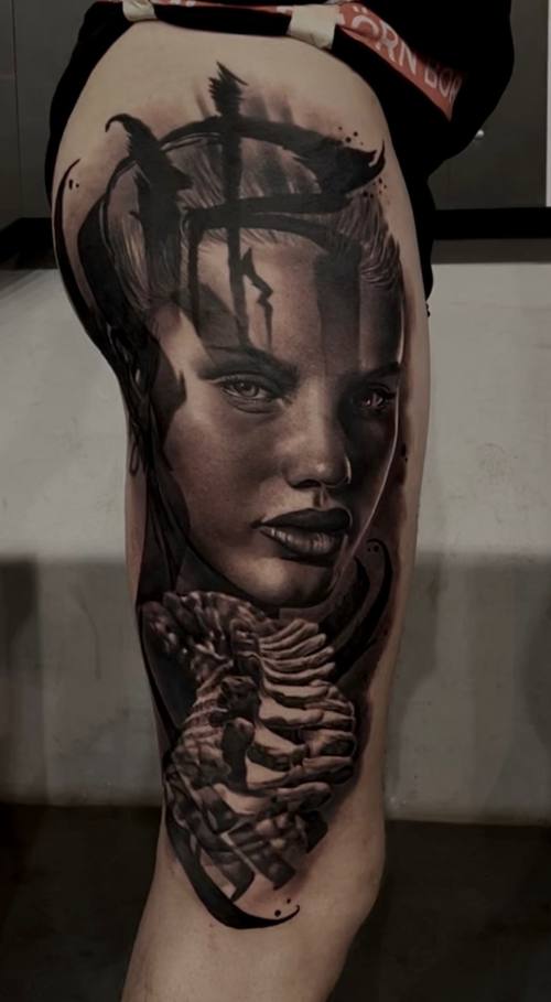 Woman's portrait with a skeletal hand, black and grey realism upper arm tattoo by Marko at KAZENTATTOO, Los Angeles