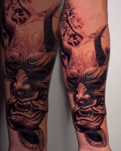Japanese hannya masks with horns, black and grey forearm sleeve by Nihat at KAZENTATTOO, Los Angeles