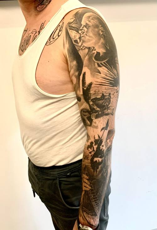 Black and grey tattoo sleeve with portraits and graphic elements by Padre at KAZENTATTOO, Los Angeles