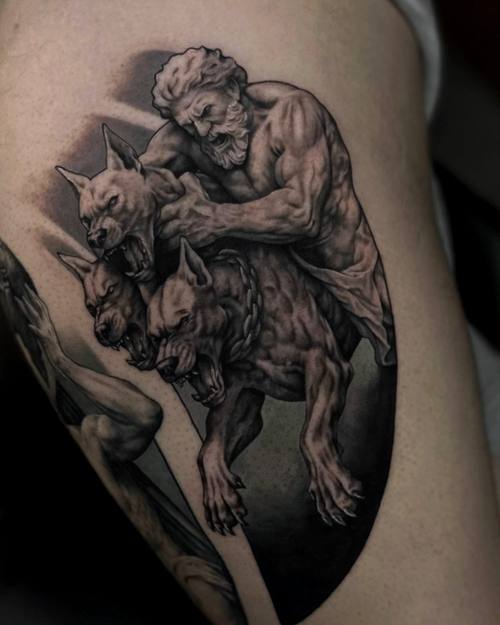 Three-headed hellhound with a muscular figure, black and grey thigh tattoo by Sam at KAZENTATTOO, Los Angeles