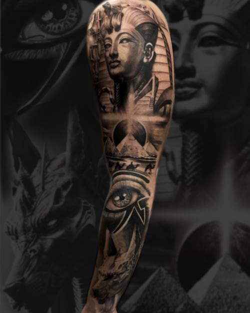 Egyptian full sleeve with a pharaoh bust, the eye of Horus and pyramids, black and grey by Sam at KAZENTATTOO, Los Angeles