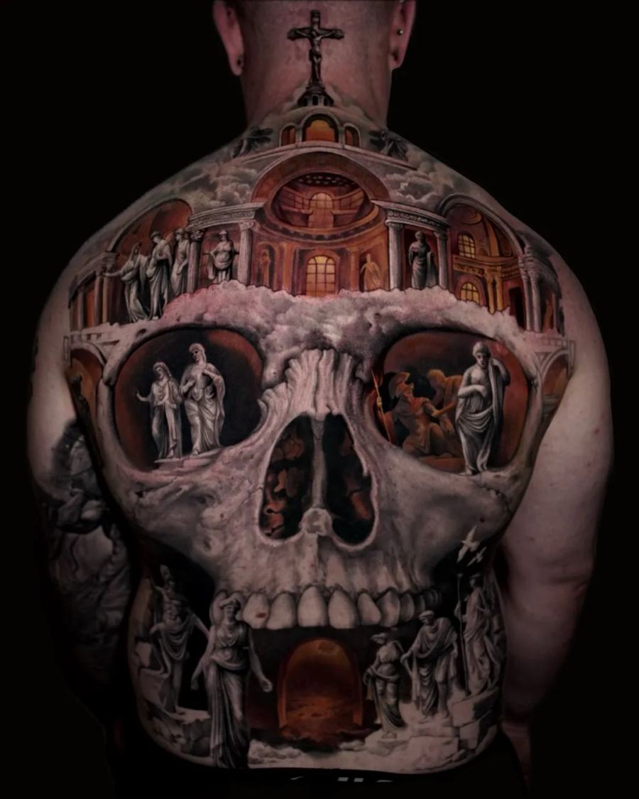 Skull with basilica interior and marble statues, full back tattoo by Vladimir Kozachenko at KAZENTATTOO, Los Angeles