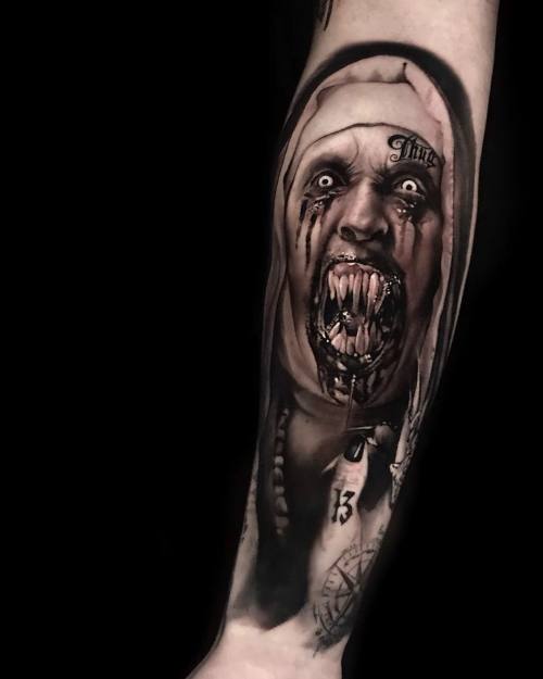 Horror nun portrait, black and grey realism forearm tattoo