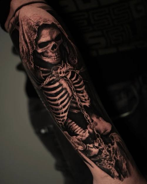 Reaper skeleton with ornament, black and grey arm tattoo