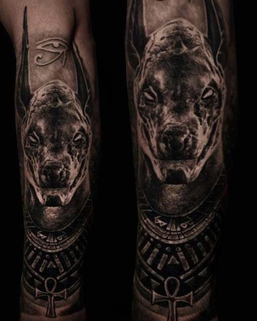 Anubis with Egyptian ornament, black and grey calf tattoo